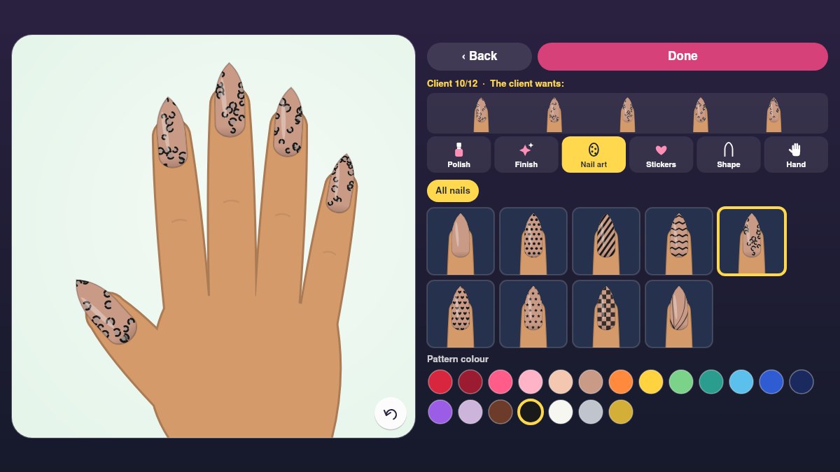 Nail Art Studio, client 10: a hand with long stiletto nails in mocha with a black leopard print next to the nail art tiles